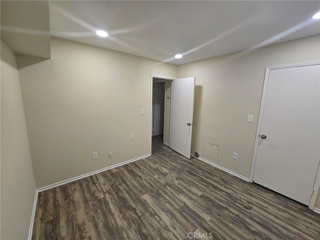 220 12th Street, Unit 8 Huntington Beach, CA 92648 - Photo 6 of 10 a view of an empty room