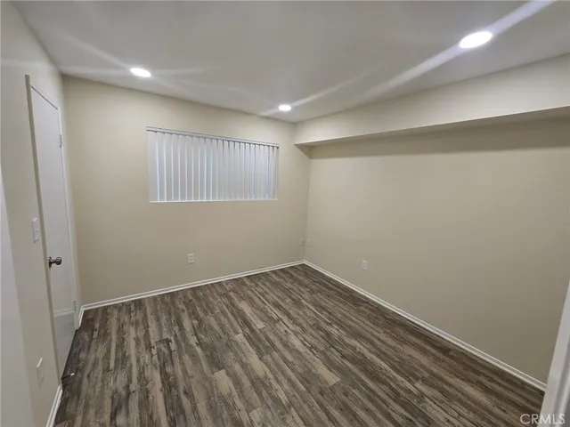 a bathroom with a double vanity sink and mirror
