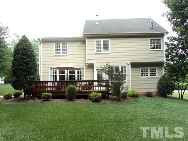 6900 Wilderness Road Raleigh, NC 27613 - Photo 25 of 25 a view of a house with backyard