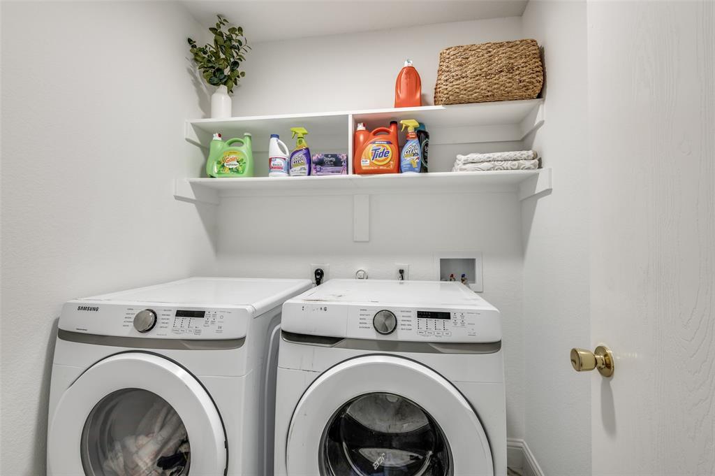 2416 Big Spring Drive Fort Worth, TX 76120 - Photo 24 of 36 a utility room with dryer and washer