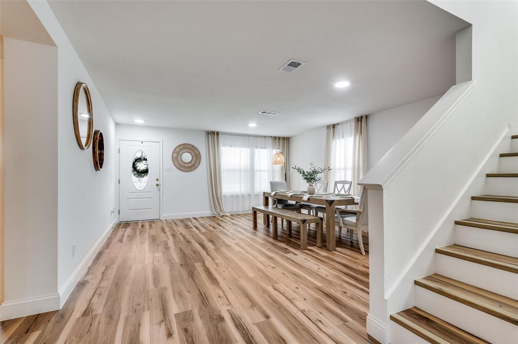 2416 Big Spring Drive Fort Worth, TX 76120 - Photo 3 of 36 a view of a livingroom with furniture and hardwood floor