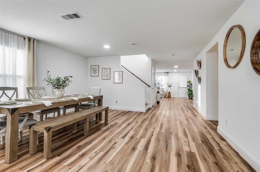 2416 Big Spring Drive Fort Worth, TX 76120 - Photo 5 of 36 a view of kitchen with furniture and wooden floor