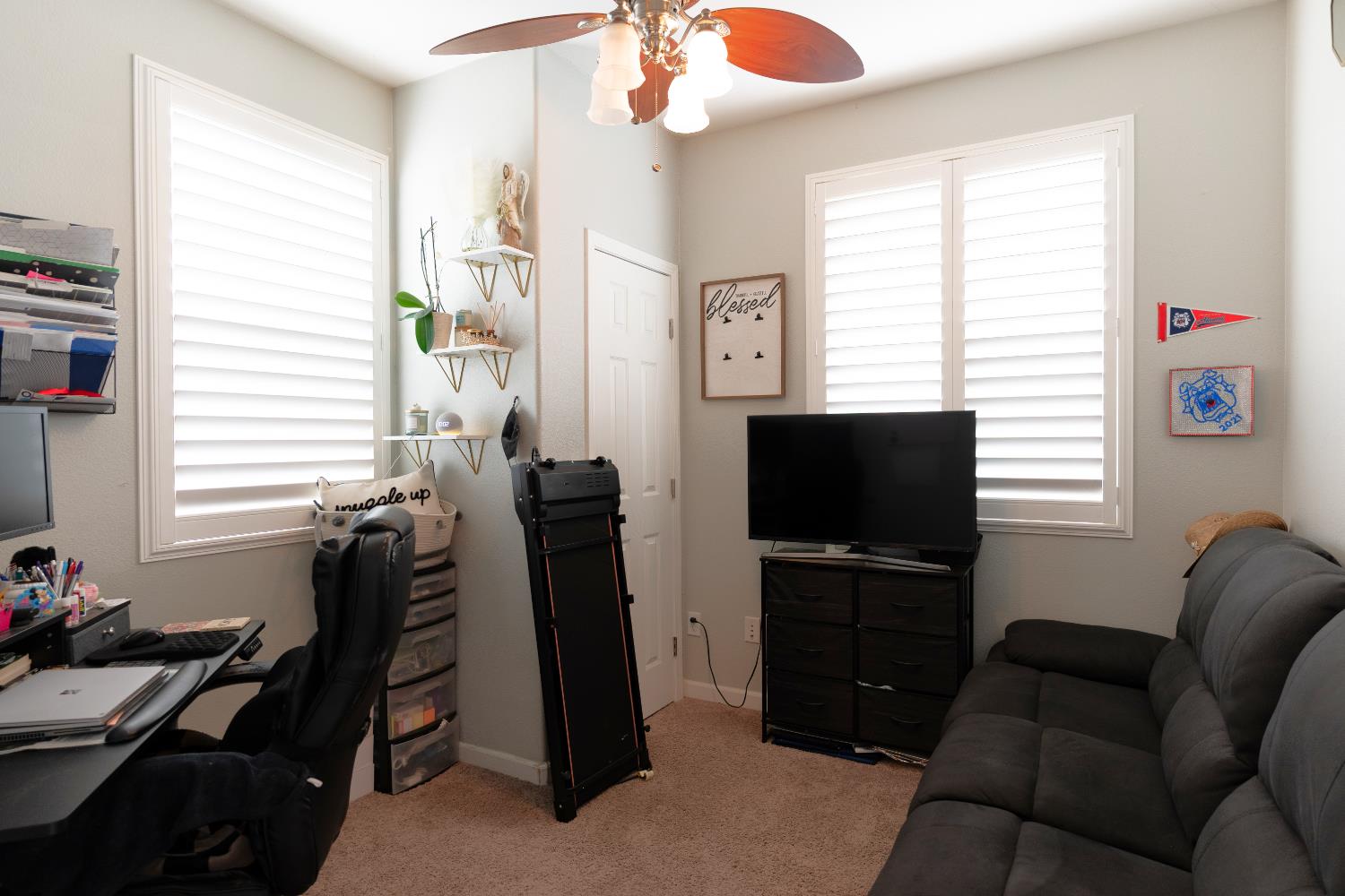 1358 Tevin Way Madera, CA 93637 - Photo 12 of 13 a living room with furniture and a flat screen tv