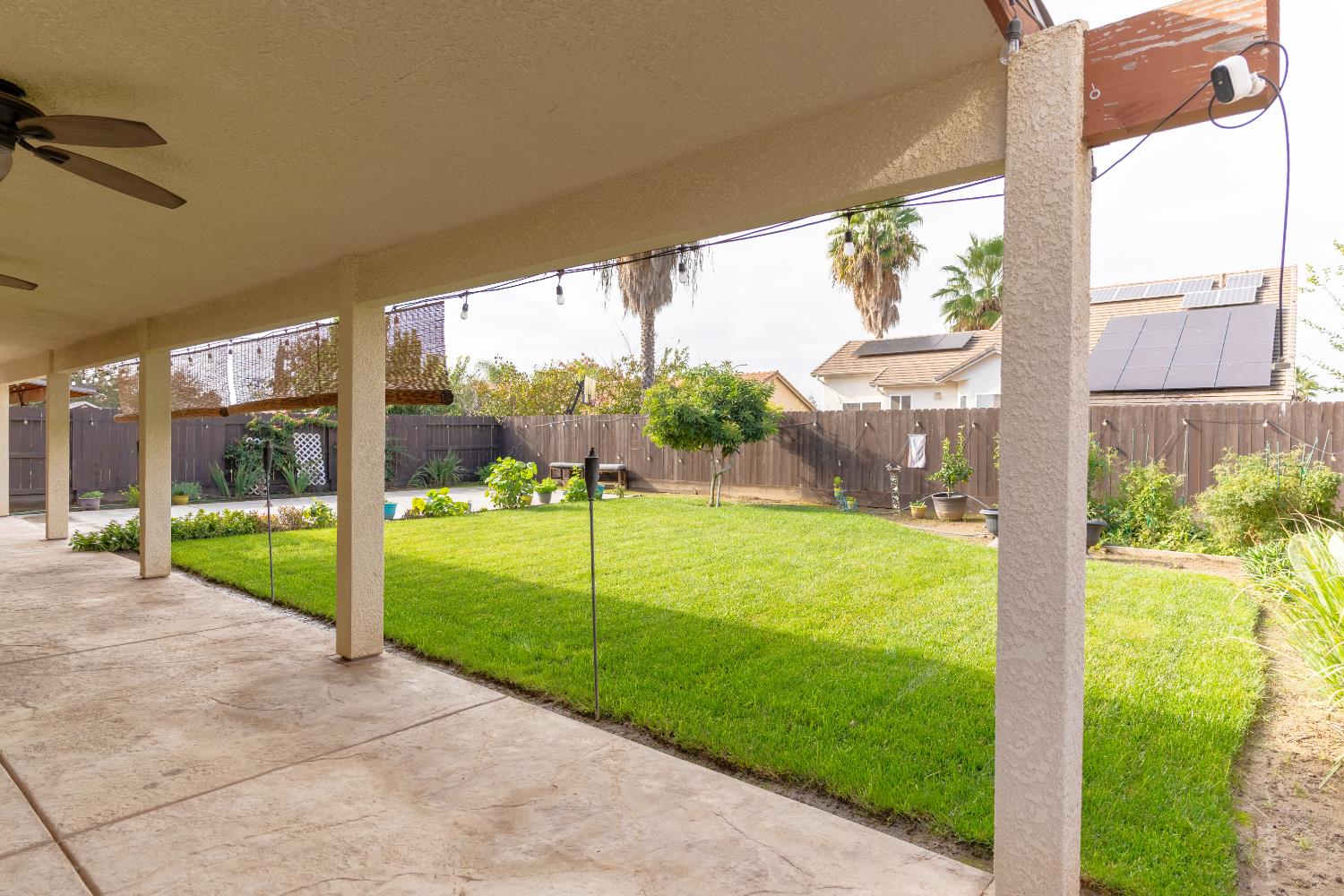 1358 Tevin Way Madera, CA 93637 - Photo 13 of 13 a view of a porch and garden