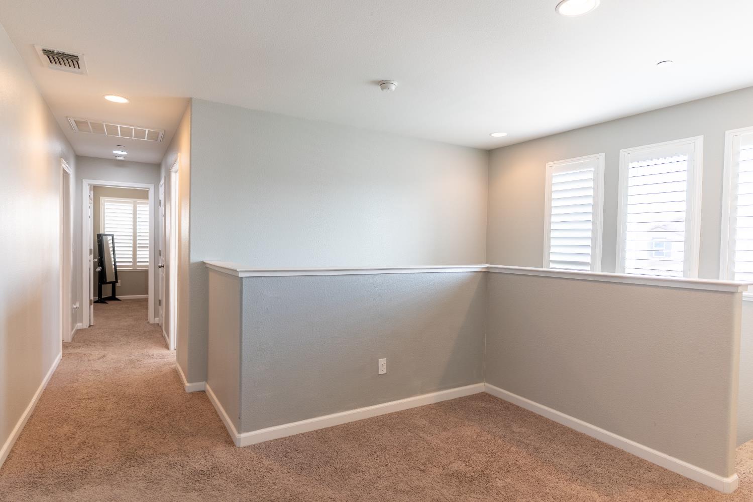 1358 Tevin Way Madera, CA 93637 - Photo 5 of 13 an empty room with windows