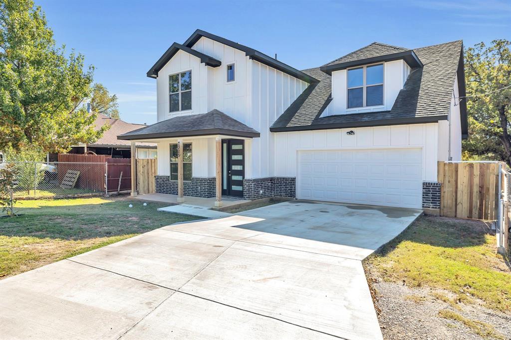 7305 Charbonneau Road Lake Worth, TX 76135 - Photo 2 of 40 a front view of a house with a yard