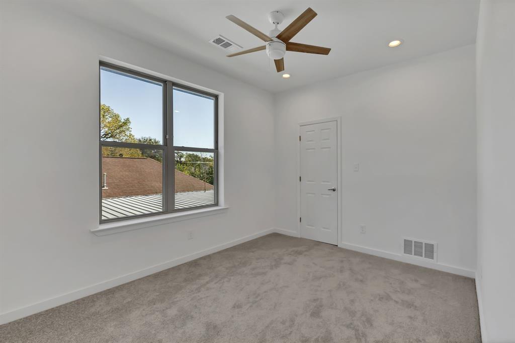 7305 Charbonneau Road Lake Worth, TX 76135 - Photo 29 of 40 an empty room with a window