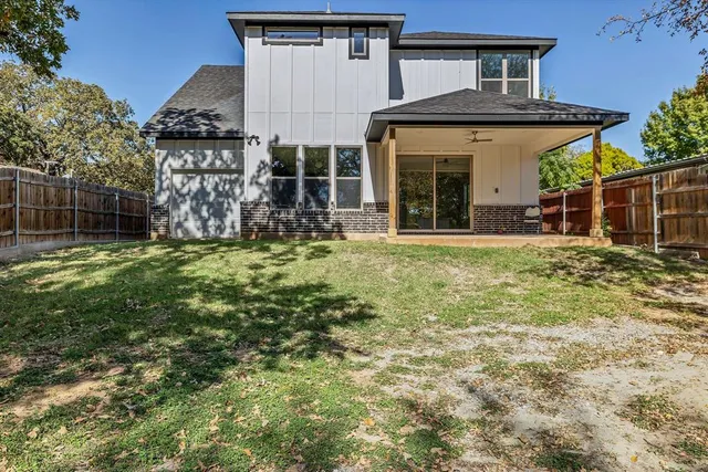 a view of a backyard with a garden