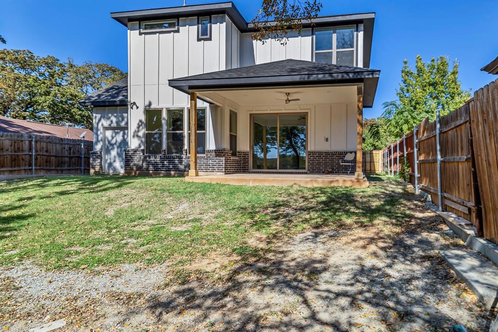 7305 Charbonneau Road Lake Worth, TX 76135 - Photo 37 of 40 a front view of a house with a yard