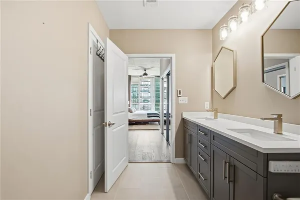 a view of balcony with two chairs and a table