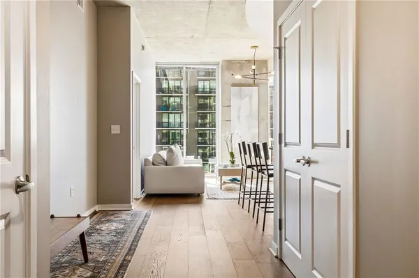 a swimming pool view with a outdoor seating space