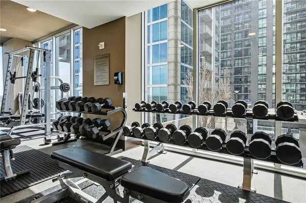 a kitchen with stainless steel appliances granite countertop wooden cabinets a sink and dishwasher