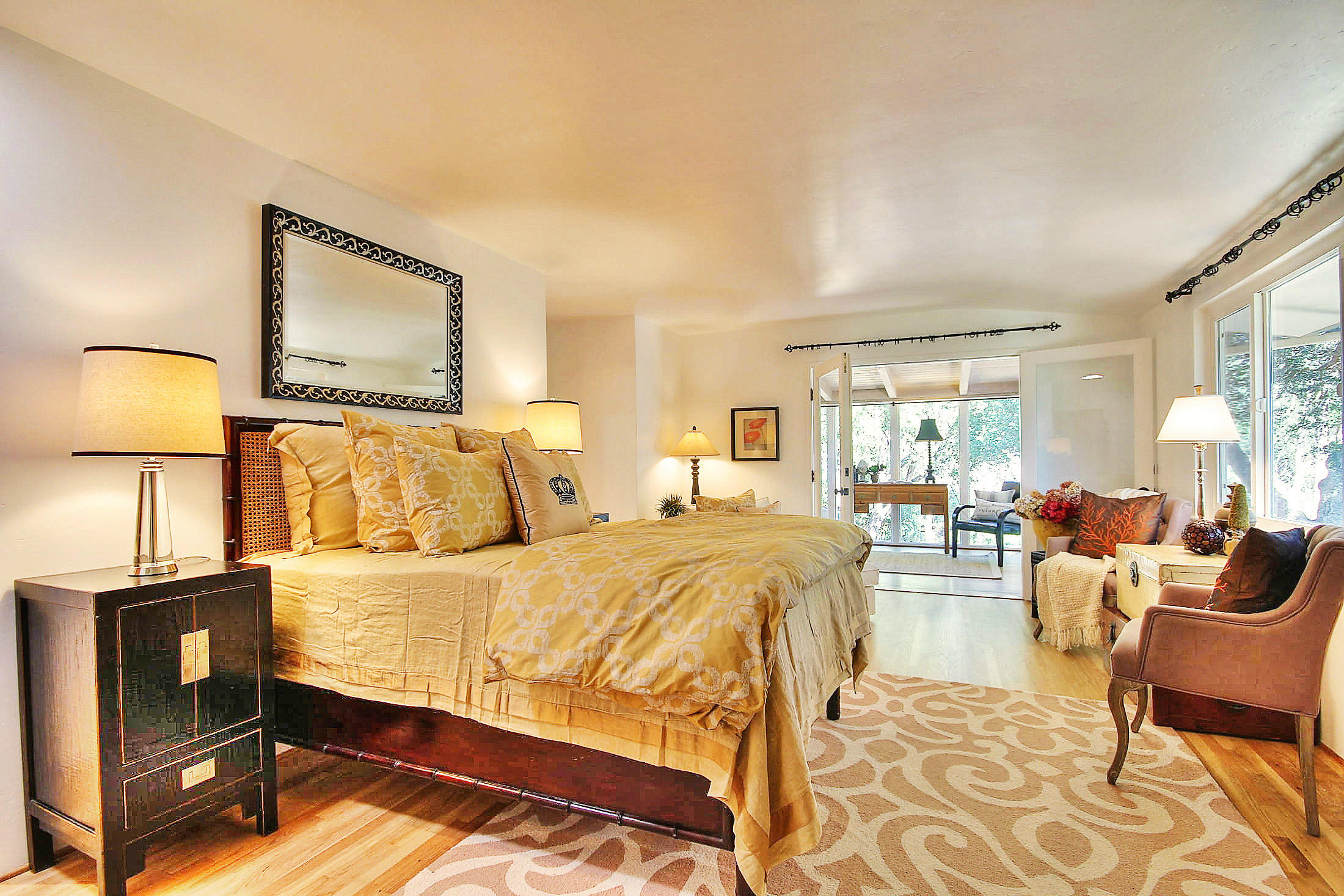 790 Ladera Lane Montecito, CA 93108 - Photo 6 of 13 a bed room with a bed and a lamp