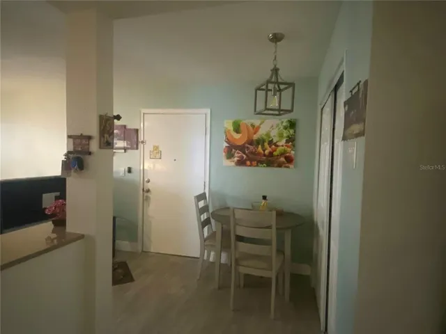 a view of a dining room with furniture