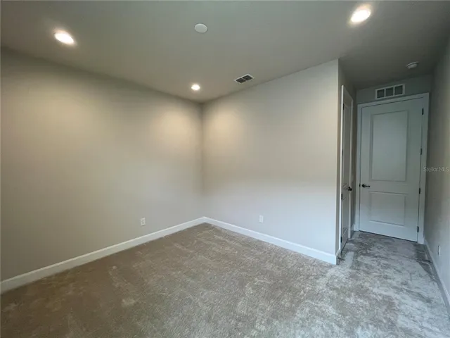 an empty room with a natural light