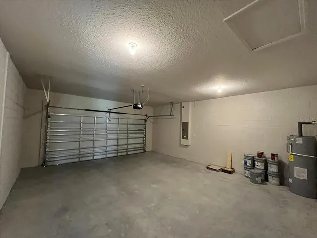 a view of a hallway with a room