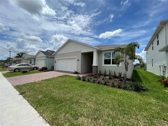 a house view with a garden space