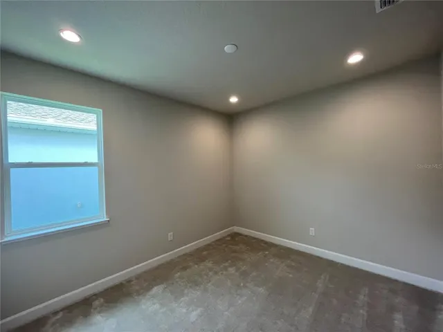 an empty room with a workbench