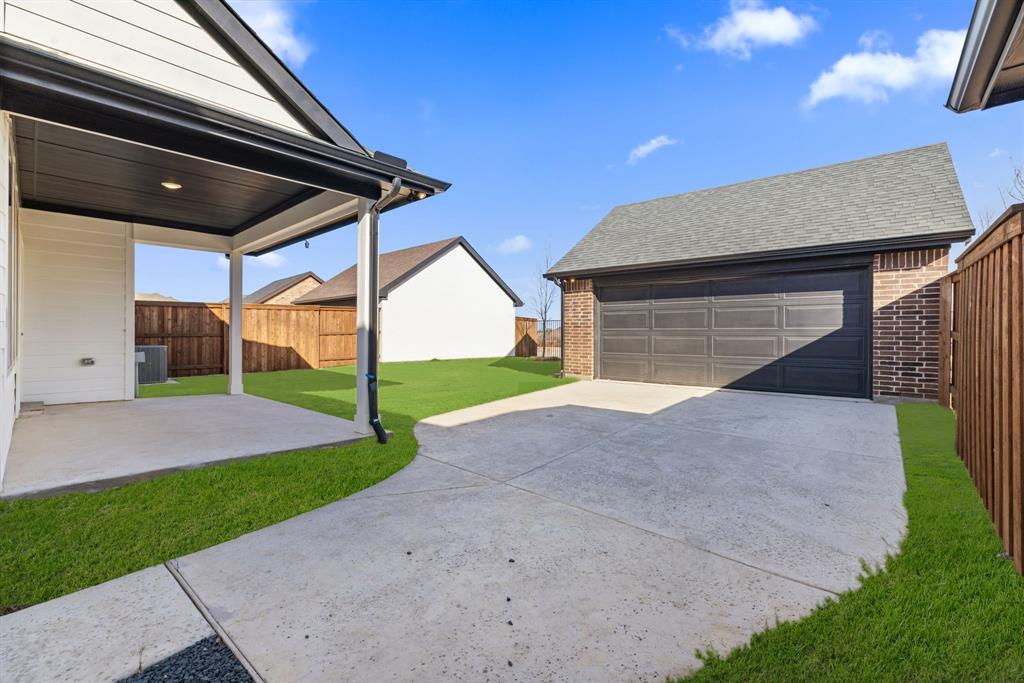 1847 Cole Road Van Alstyne, TX 75495 - Photo 16 of 26 You'll enjoy morning coffee or unwinding in the evenings on this wonderful covered back patio.