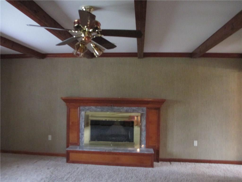 117 Parise Road Forest Hills, PA 15221 - Photo 12 of 23 a living room with a fireplace