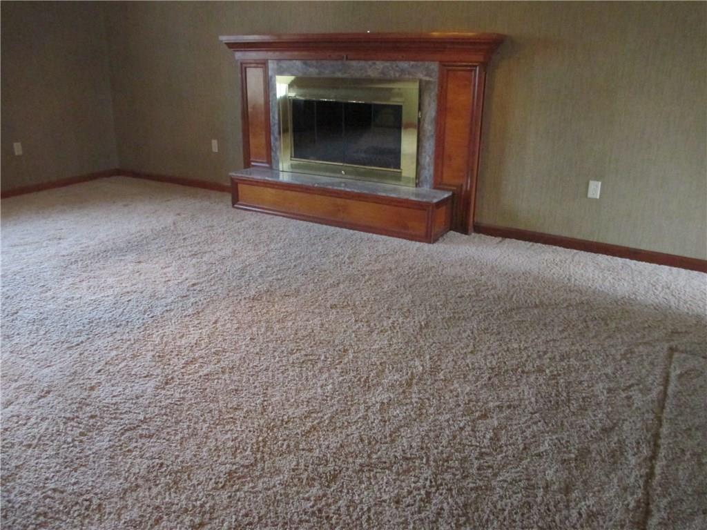 117 Parise Road Forest Hills, PA 15221 - Photo 13 of 23 a view of empty room with a fireplace