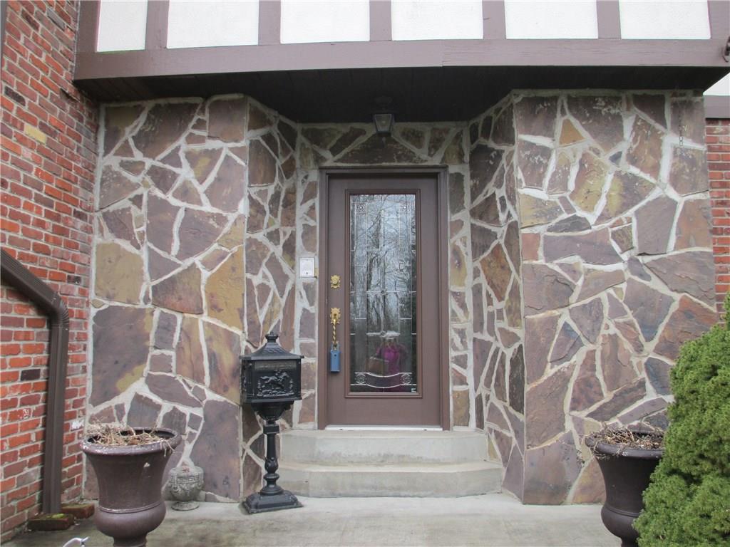117 Parise Road Forest Hills, PA 15221 - Photo 4 of 23 a front view of a house with a potted plant