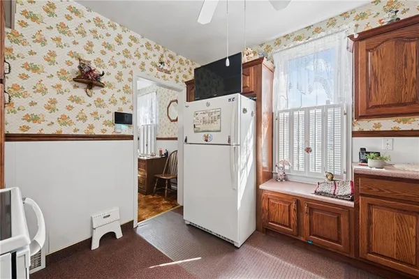 a kitchen with stainless steel appliances a refrigerator and a sink