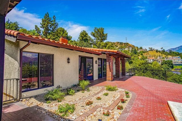 a view of a house with a patio
