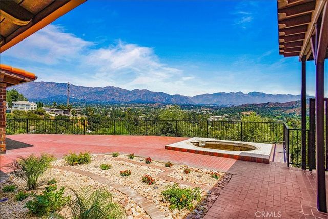 a view of an outdoor space with mountain view