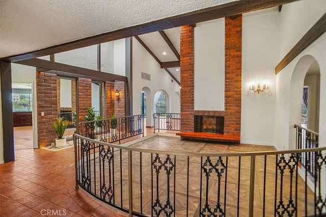 a view of balcony with furniture