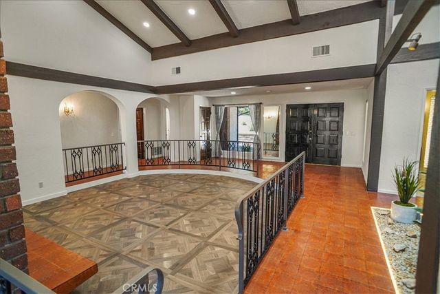 a view of a hallway with a large window