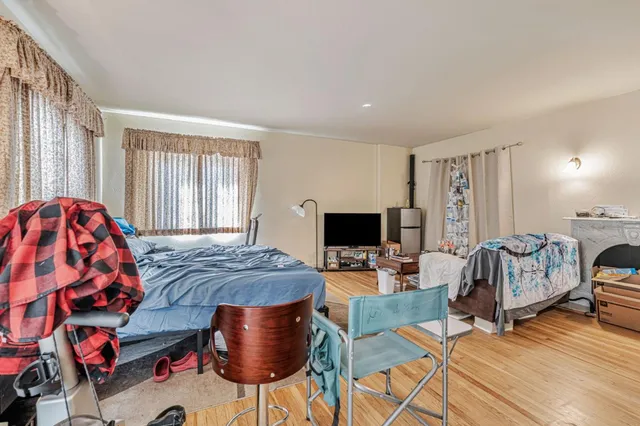 a bedroom with a bed and a closet