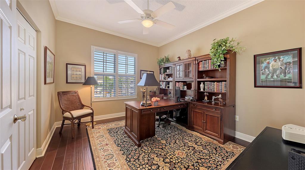 6465 Water Crest Way, Unit 404 Lakewood Ranch, FL 34202 - Photo 41 of 62 a view of a workspace with furniture and a window
