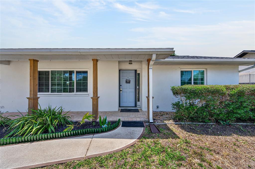 532 Center Road Venice, FL 34285 - Photo 4 of 68 front view of a house with a yard