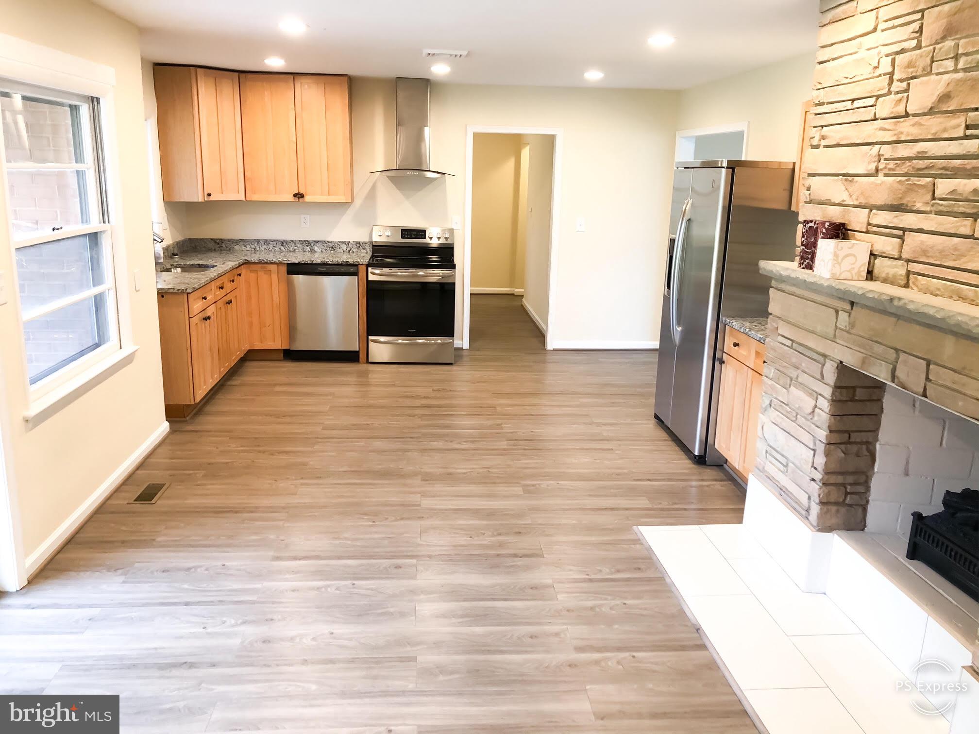 7290 Kindler Road Columbia, MD 21046 - Photo 10 of 30 KITCHEN & FAMILY ROOM