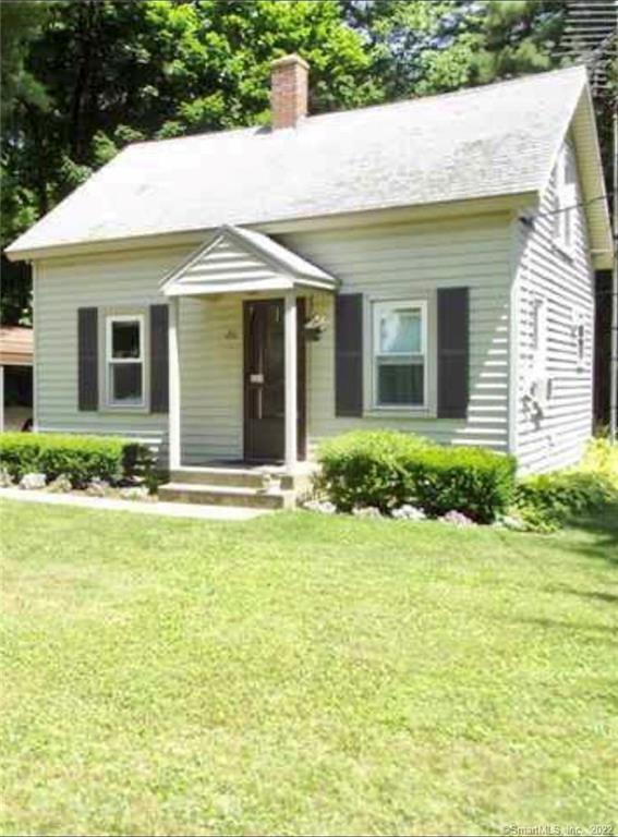 26 Ware Road Killingly, CT 06241 - Photo 1 of 1 a view of a white house next to a yard with potted plants