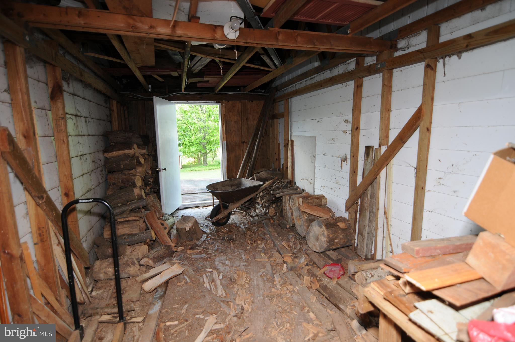 1525 State Road Coopersburg, PA 18036 - Photo 12 of 54 Wood Storage between garage and workshop