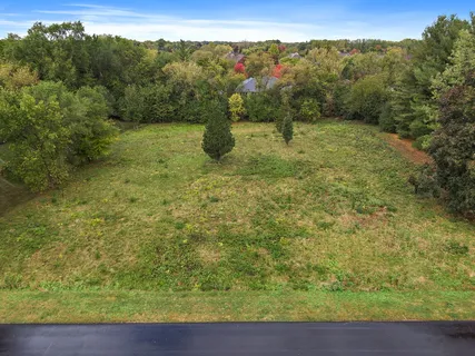 a view of a yard with an outdoor space