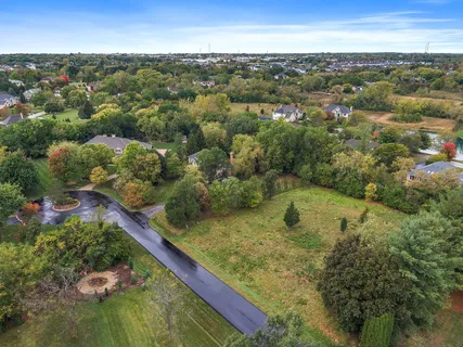 a view of a lake with a yard