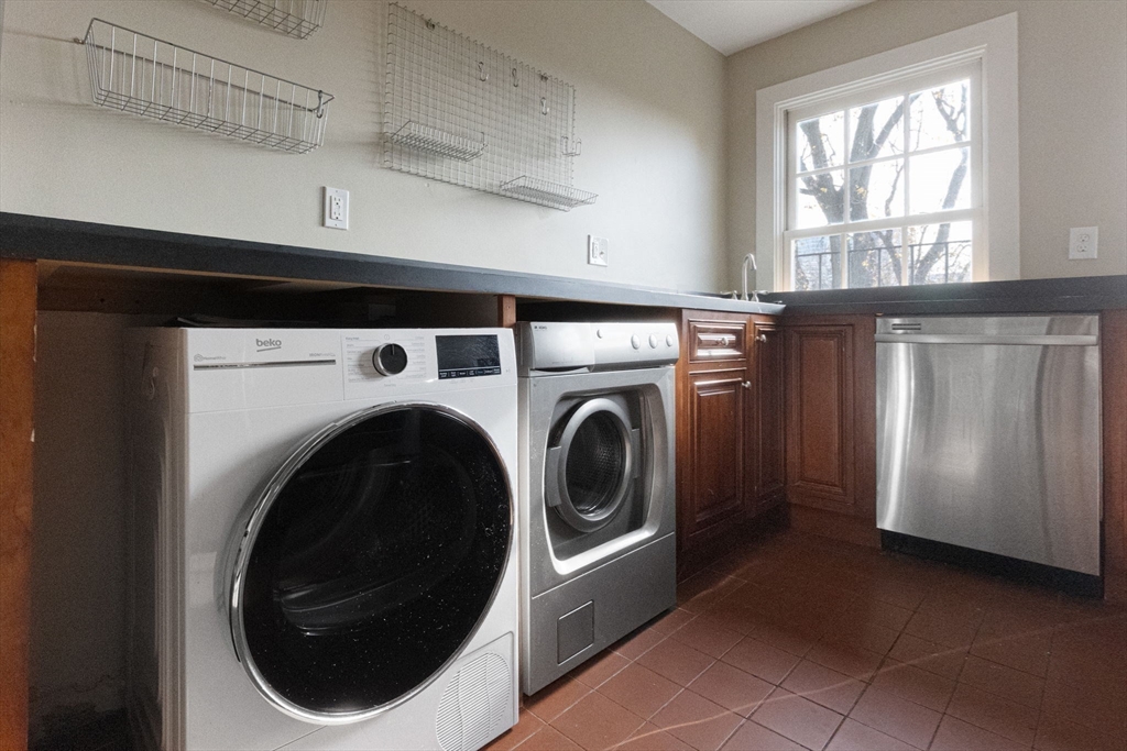 14 Chestnut Street, Unit 4 Boston, MA 02108 - Photo 6 of 12 a utility room with dryer and washer