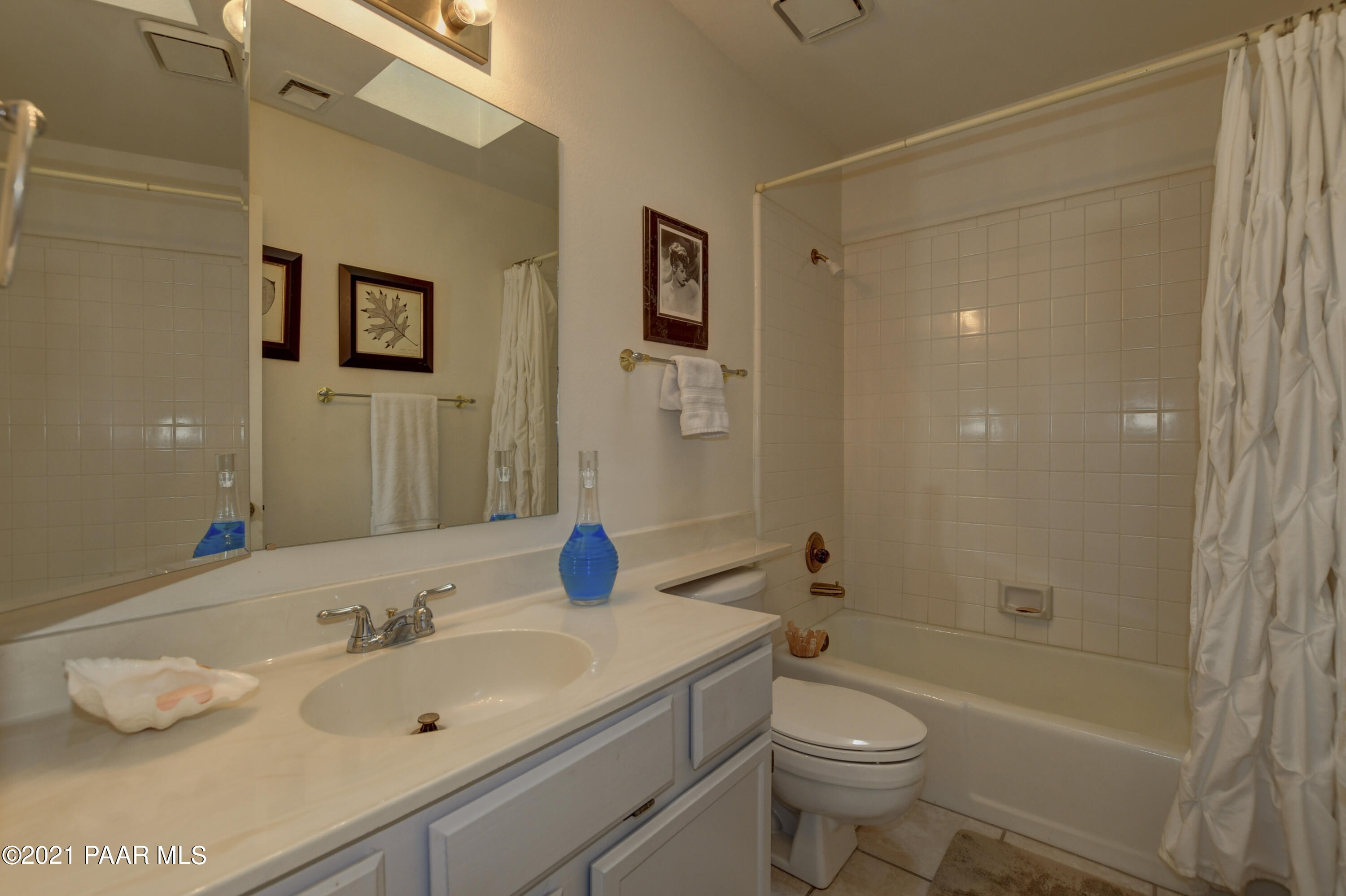 1034 Bunker Place Dewey, AZ 86327 - Photo 19 of 40 a bathroom with a sink a toilet and shower