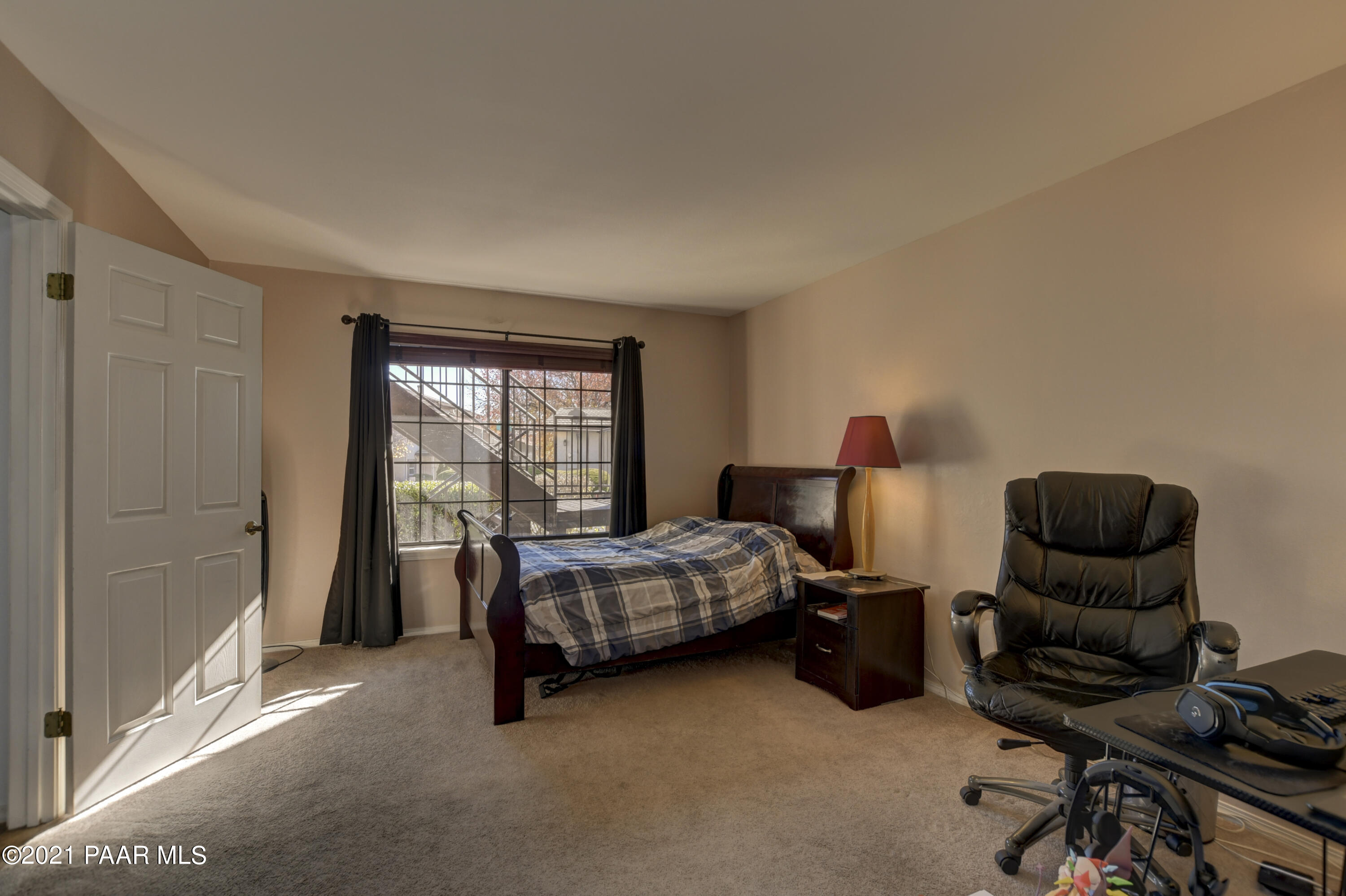 1034 Bunker Place Dewey, AZ 86327 - Photo 22 of 40 a bed room with furniture and a window