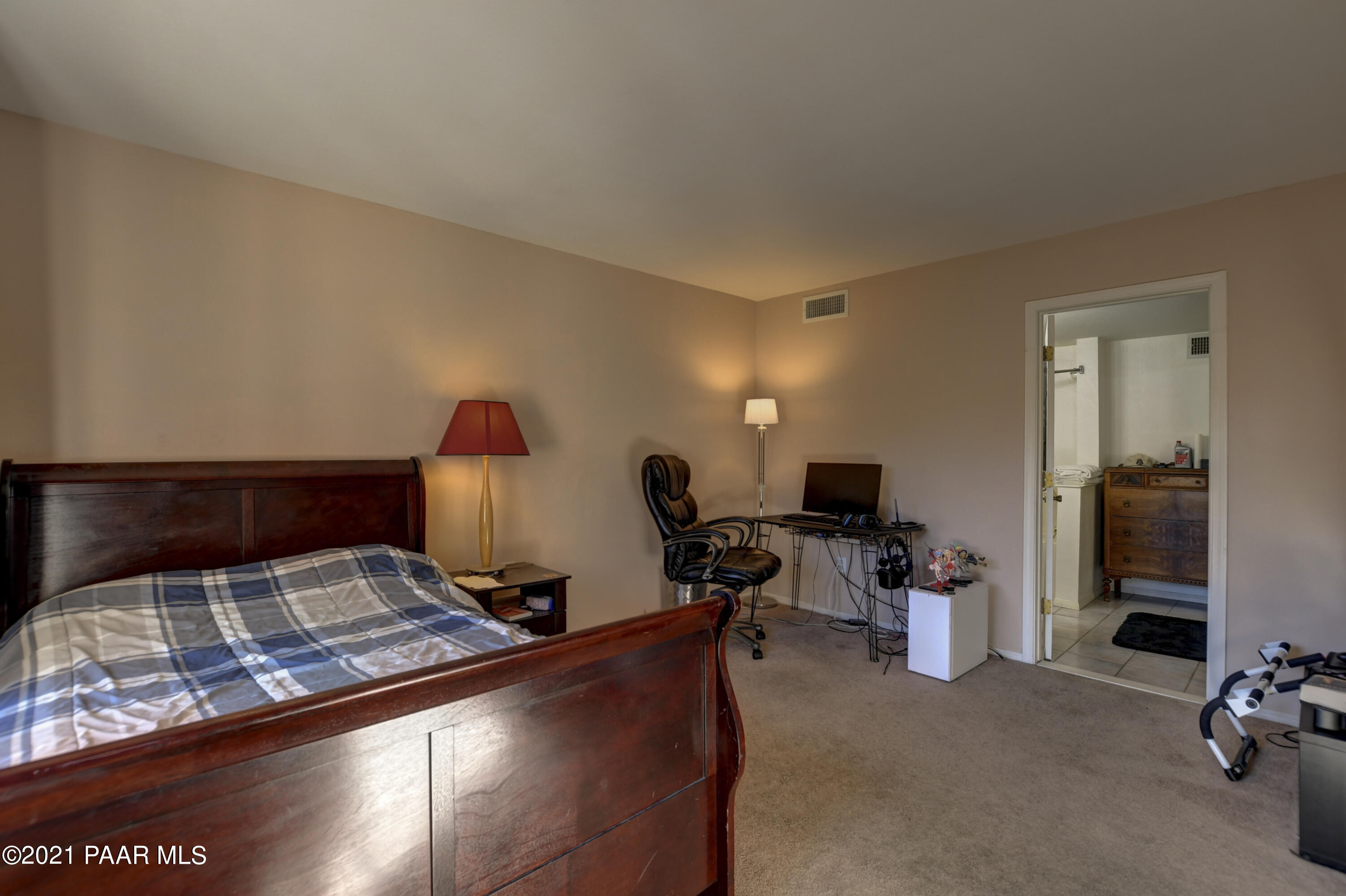 1034 Bunker Place Dewey, AZ 86327 - Photo 23 of 40 a room with furniture and a flat screen tv