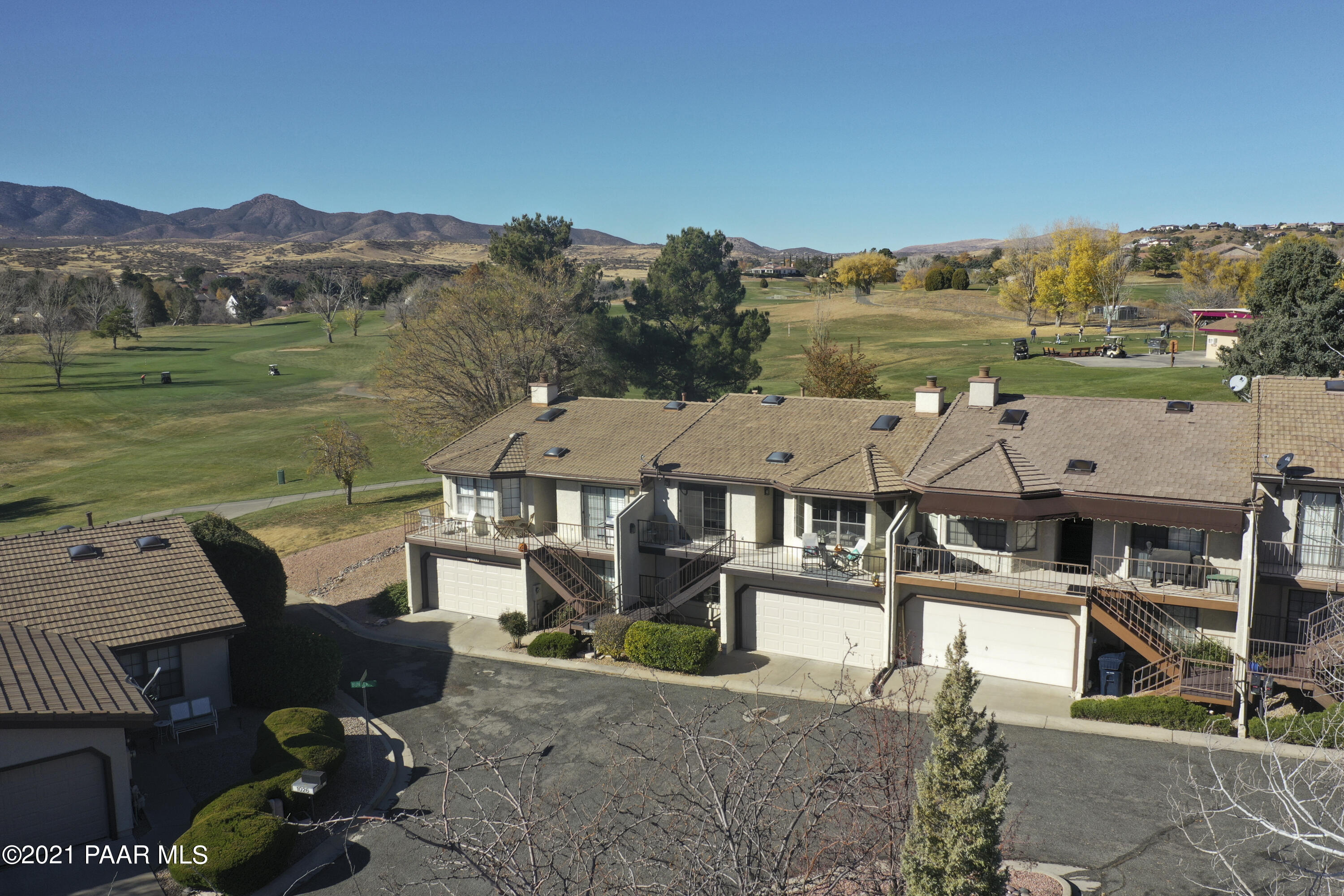 1034 Bunker Place Dewey, AZ 86327 - Photo 32 of 40 an aerial view of a house with a garden and lake view