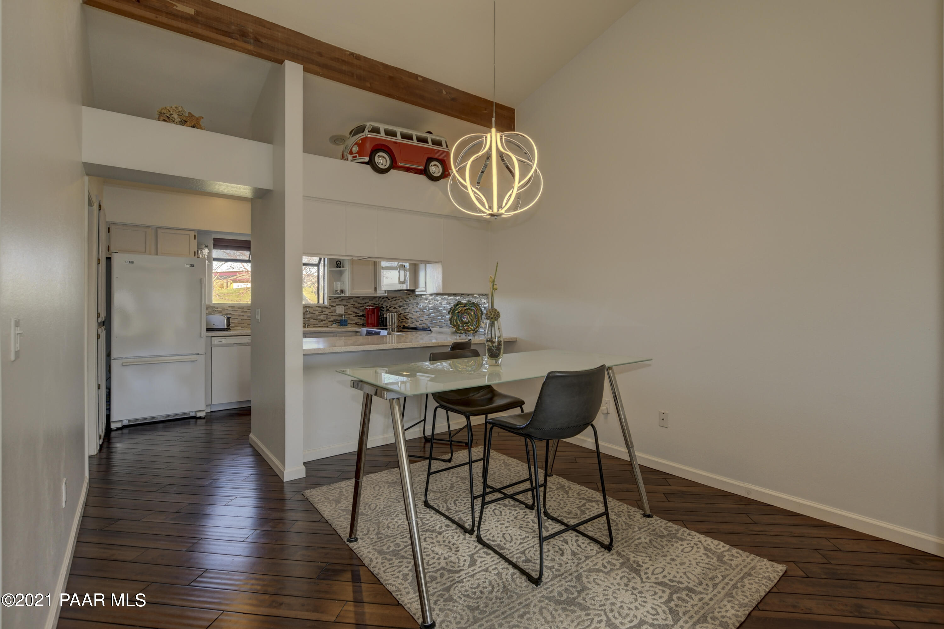 1034 Bunker Place Dewey, AZ 86327 - Photo 9 of 40 a view of a dining room with furniture and wooden floor