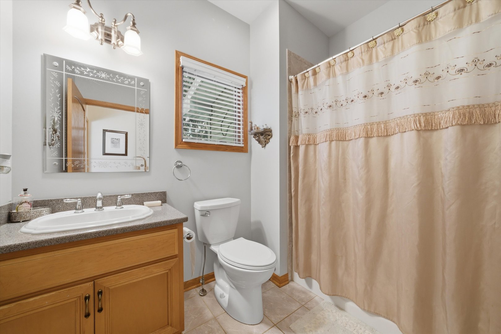 17305 West 145th Street Lockport, IL 60441 - Photo 20 of 29 a bathroom with a toilet sink and a mirror