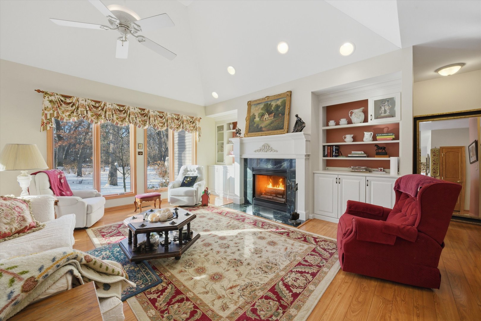 17305 West 145th Street Lockport, IL 60441 - Photo 7 of 29 a living room with furniture fireplace and a table