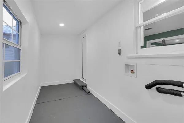 a view of a room with rack on the wall