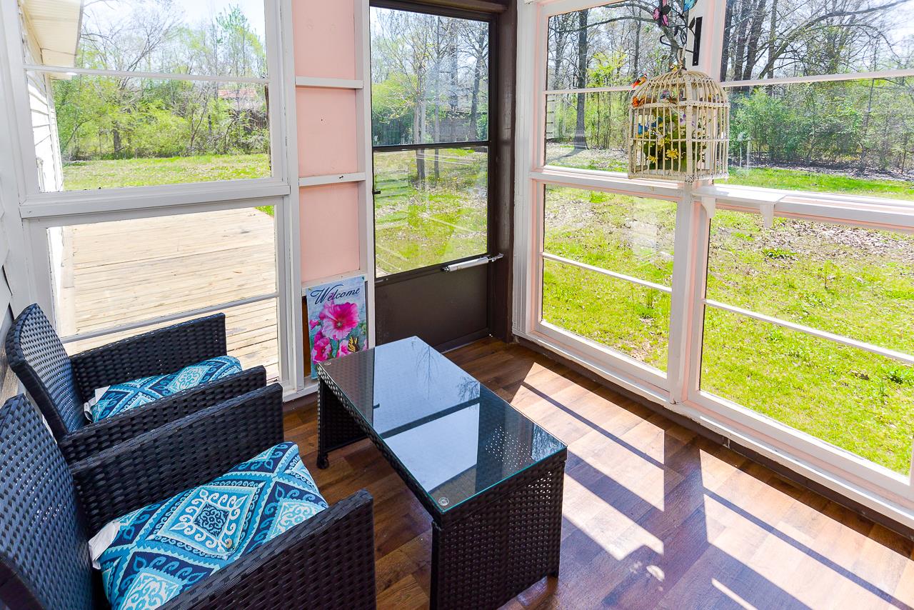 469 Limestone Road Elora, TN 37328 - Photo 21 of 30 a living room with fireplace furniture and a large window