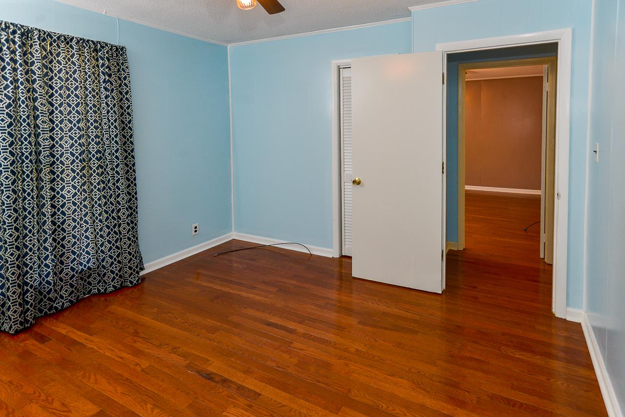 469 Limestone Road Elora, TN 37328 - Photo 29 of 30 a view of an empty room with wooden floor
